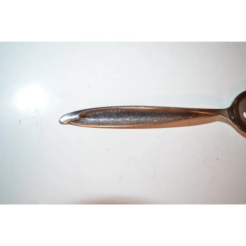 International Deluxe AMERICANA slotted Pierced Serving Spoon  8 1/2
